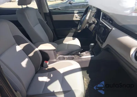 2017 Toyota Corolla Le z USA, uszkodzony, nr VIN 2T1BURHE2HC801595